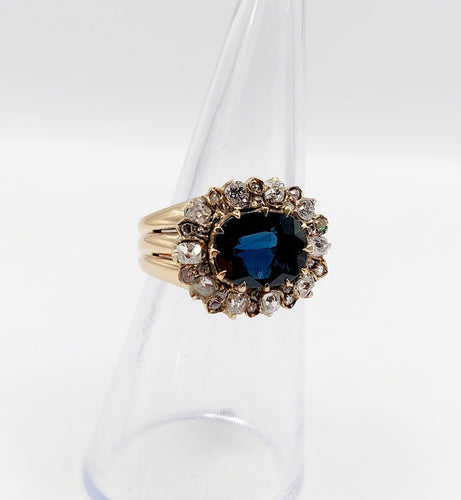 Bague 52 Bague marguerite en or rose, saphir naturel et diamants, vers 1900 58 Facettes A08011