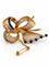 Broche Broche ruban rétro en or 18 carats, diamants et saphirs 58 Facettes 90882