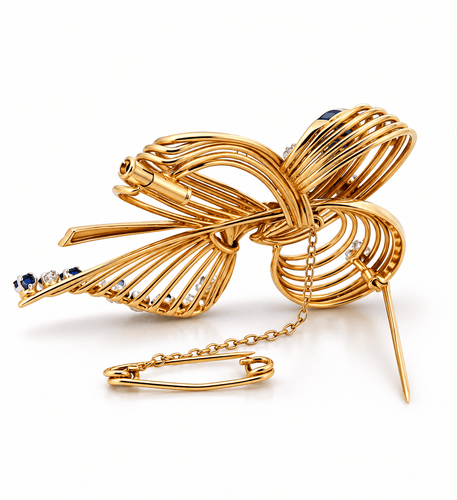 Broche Broche ruban rétro en or 18 carats, diamants et saphirs 58 Facettes 90882