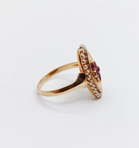 Bague 56 Bague marquise victorienne en or rose 18k, rubis et perles, vers 1890 58 Facettes A08014