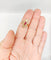 Bague 56 Bague marquise victorienne en or rose 18k, rubis et perles, vers 1890 58 Facettes A08014