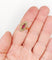 Bague 56 Bague marquise victorienne en or rose 18k, rubis et perles, vers 1890 58 Facettes A08014