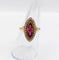 Bague 56 Bague marquise victorienne en or rose 18k, rubis et perles, vers 1890 58 Facettes A08014