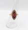 Bague 56 Bague marquise victorienne en or rose 18k, rubis et perles, vers 1890 58 Facettes A08014