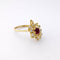 Bague 55 Bague en or jaune 18 carats, rubis cabochon et diamants 58 Facettes 35964
