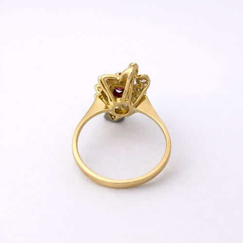Bague 55 Bague en or jaune 18 carats, rubis cabochon et diamants 58 Facettes 35964