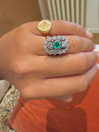 Bague 50 Bague marquise en or blanc et platine, émeraude et diamants 58 Facettes vzvzlzl