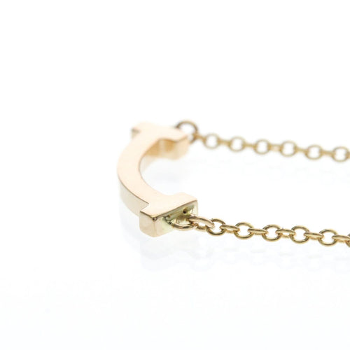Collier Tiffany & Co. - Pendentif T Smile en or rose 18k 58 Facettes vta3dkywf3