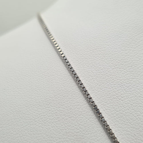 Collier Collier en or blanc 18 carats avec pendentif serti d’un diamant naturel 58 Facettes #2531 #2316
