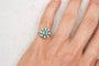Bague 44 Bague flocon en or blanc 18 carats, émeraude et diamants 58 Facettes 4055