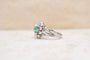 Bague 44 Bague flocon en or blanc 18 carats, émeraude et diamants 58 Facettes 4055