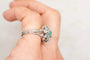 Bague 44 Bague flocon en or blanc 18 carats, émeraude et diamants 58 Facettes 4055