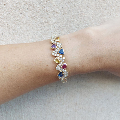 Bracelet Cristilli - Bracelet jonc en or jaune 18k, diamants et saphirs 58 Facettes 277