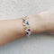 Bracelet Cristilli - Bracelet jonc en or jaune 18k, diamants et saphirs 58 Facettes 277