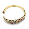 Bracelet Cristilli - Bracelet jonc en or jaune 18k, diamants et saphirs 58 Facettes 277