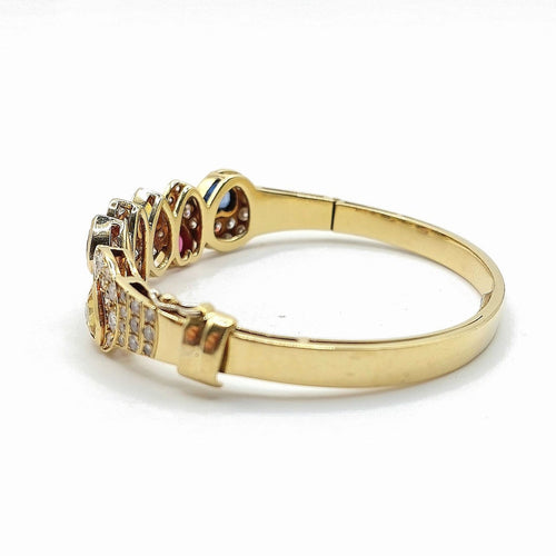 Bracelet Cristilli - Bracelet jonc en or jaune 18k, diamants et saphirs 58 Facettes 277