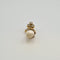 Pendentif Pendentif en or jaune 18 carats serti d’une perle 58 Facettes #2807