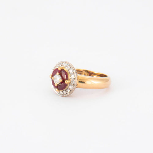 Bague en or jaune 750/1000, diamants pavés et 4 rubis navette 58 Facettes Bague