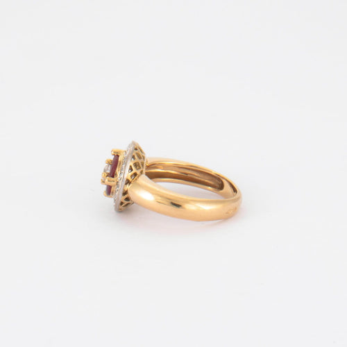 Bague en or jaune 750/1000, diamants pavés et 4 rubis navette 58 Facettes Bague