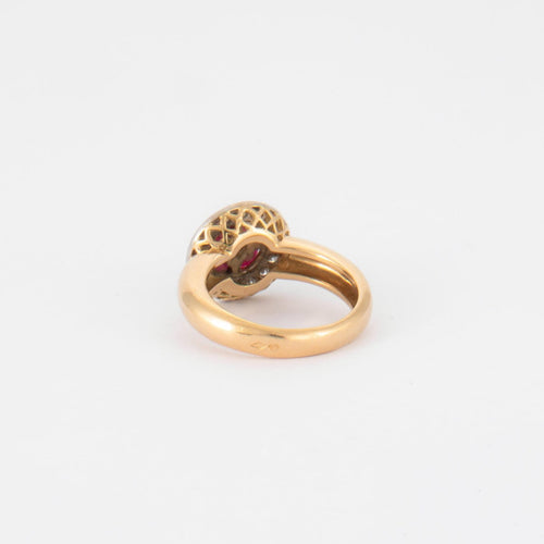 Bague en or jaune 750/1000, diamants pavés et 4 rubis navette 58 Facettes Bague