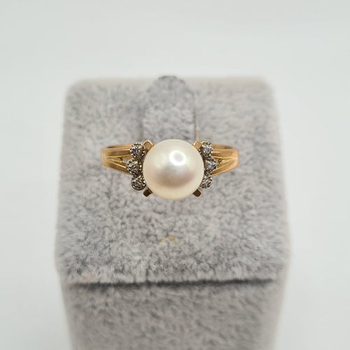 Bague 56.5 Bague en or rose 18k avec perle de culture 58 Facettes #3141