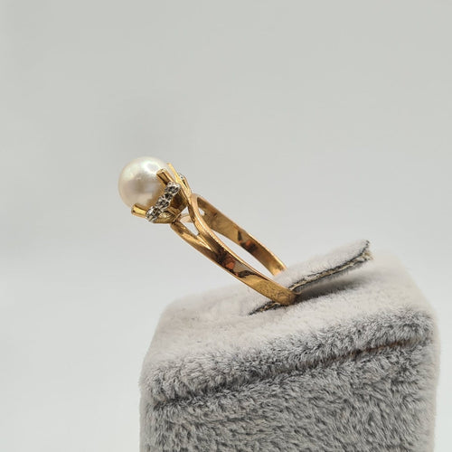 Bague 56.5 Bague en or rose 18k avec perle de culture 58 Facettes #3141