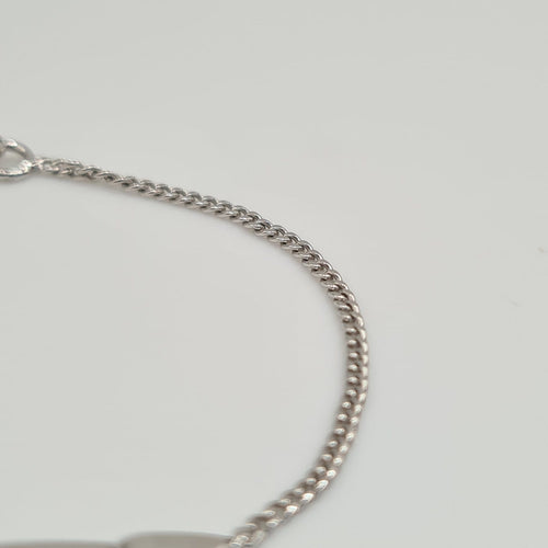 Bracelet Gourmette en or blanc 18 carats 58 Facettes #3234