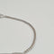 Bracelet Gourmette en or blanc 18 carats 58 Facettes #3234