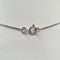 Collier Collier en or blanc 18 carats avec diamant taille émeraude 58 Facettes #3271