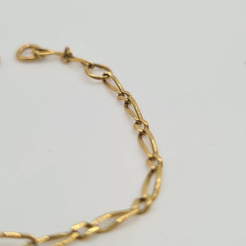 Bracelet Bracelet chaîne en or jaune 18k 58 Facettes #3496
