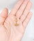 Pendentif Pendentif ancre de marine en or rose 18k, vers 1920 58 Facettes A07905