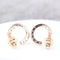 Boucles d'oreilles Boucles d’oreilles créoles ouvertes en or rose 18K avec diamants, 0,26 ct 58 Facettes 2B-R