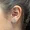 Boucles d'oreilles Boucles d’oreilles florales en or blanc 18 carats avec diamants, 0,12 ct 58 Facettes 2B-P