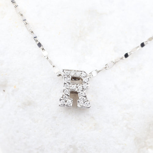 Collier Collier avec initiale R en or blanc 18k et diamants, 0,18 ct 58 Facettes 2B-SSS