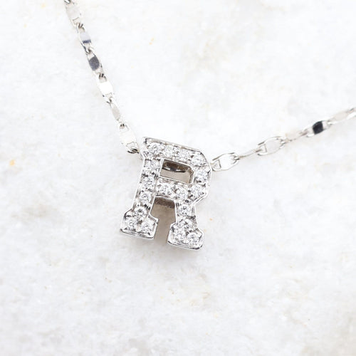 Collier Collier avec initiale R en or blanc 18k et diamants, 0,18 ct 58 Facettes 2B-SSS