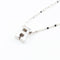 Collier Collier avec initiale R en or blanc 18k et diamants, 0,18 ct 58 Facettes 2B-SSS
