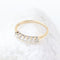 Bague Bague demi-alliance en or jaune 18k avec 7 diamants 58 Facettes 2B-FFF