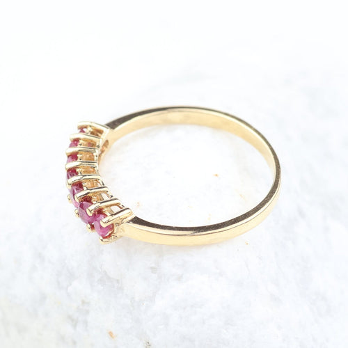 Bague Demi-alliance de 7 rubis en or jaune 18K – 0,56 ct 58 Facettes 2B-OO