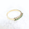 Bague Demi-alliance en or jaune 18K avec 7 émeraudes, 0,56 ct 58 Facettes 2B-EEE