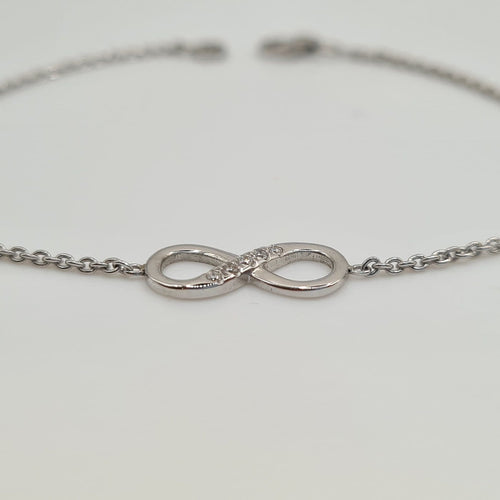 Bracelet Bracelet infini en or blanc 18 carats avec diamants 58 Facettes #3935