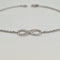 Bracelet Bracelet infini en or blanc 18 carats avec diamants 58 Facettes #3935
