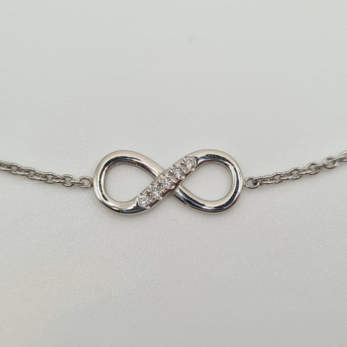 Bracelet Bracelet infini en or blanc 18 carats avec diamants 58 Facettes #3935
