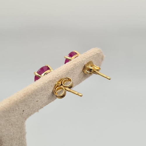 Boucles d'oreilles Boucles d’oreilles en or jaune et rubis 58 Facettes #4075
