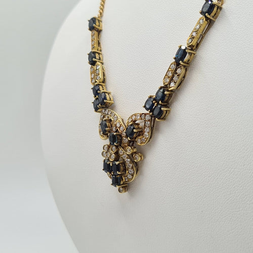 Collier Collier en or jaune 18 carats avec diamants et saphir 58 Facettes #4129