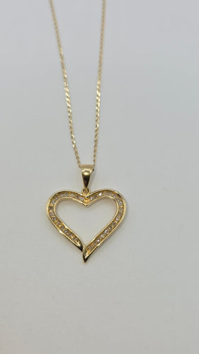 Collier Pendentif cœur en or jaune 18 carats 750 avec chaîne et diamants 58 Facettes Collier coeur or