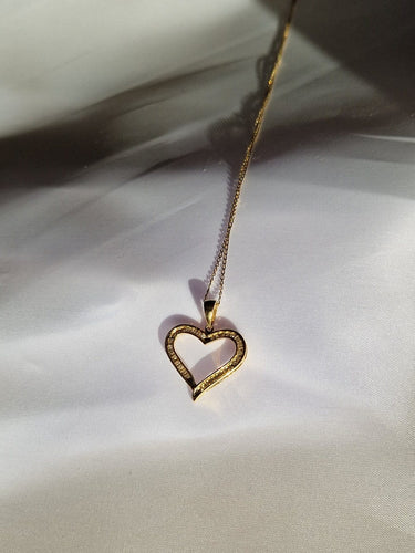 Collier Pendentif cœur en or jaune 18 carats 750 avec chaîne et diamants 58 Facettes Collier coeur or