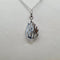 Collier Collier flamme à chaîne en or blanc 18 carats 58 Facettes #4380