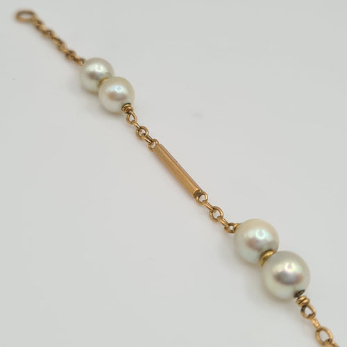 Bracelet Bracelet en or jaune 18k avec perle de culture 58 Facettes #4443