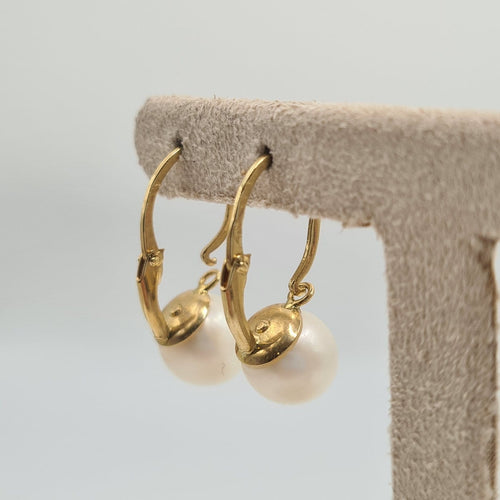 Boucles d'oreilles Boucles d’oreilles en or jaune 18k avec perles 58 Facettes #4478