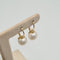 Boucles d'oreilles Boucles d’oreilles en or jaune 18k avec perles 58 Facettes #4478